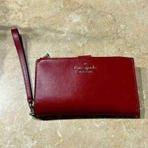 Brand New Never used Kate Spade wristlet! and cellphone holder